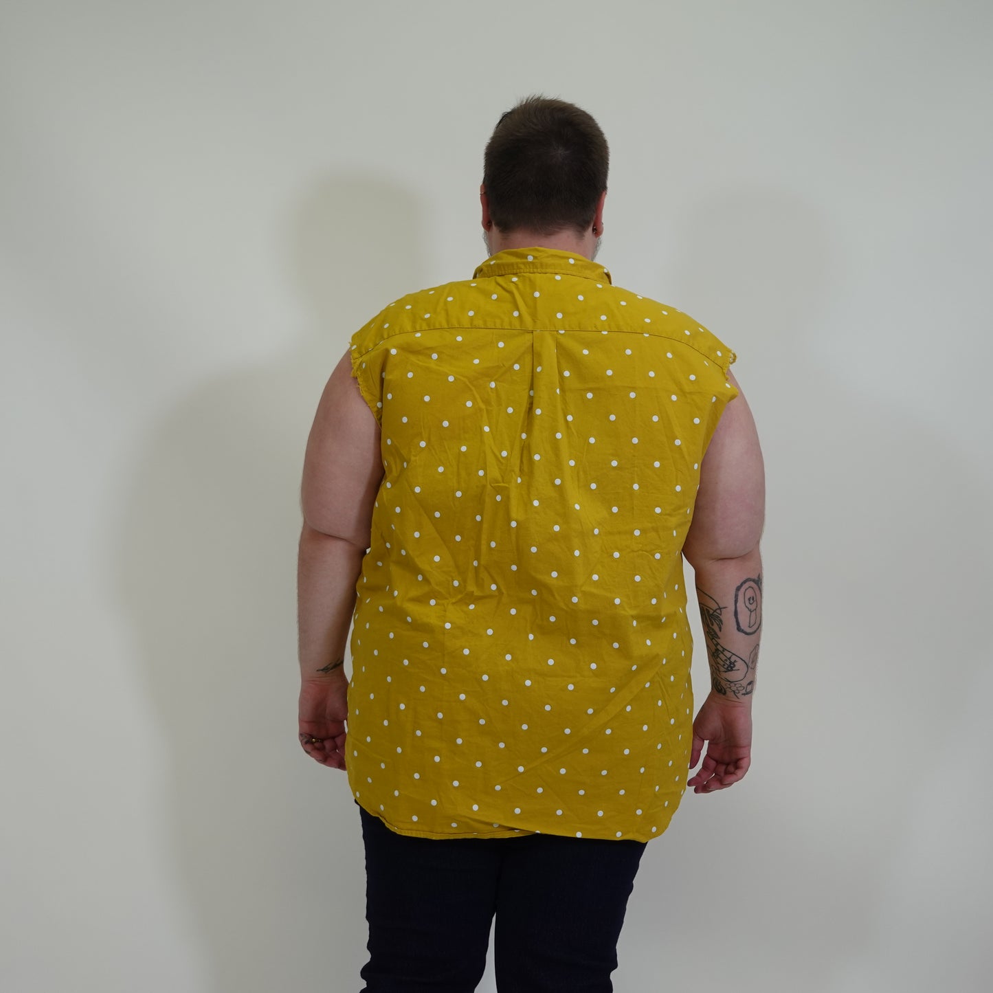 Sleeveless Yellow and White Polka Dot Button Up