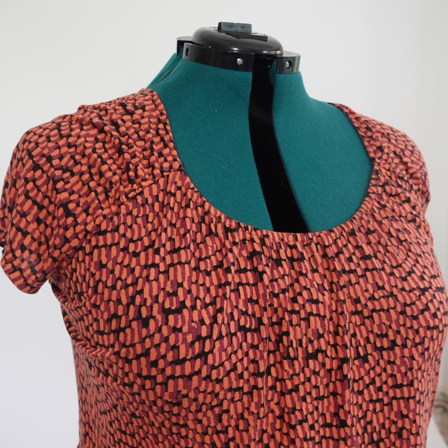Orange and Black Abstract Top