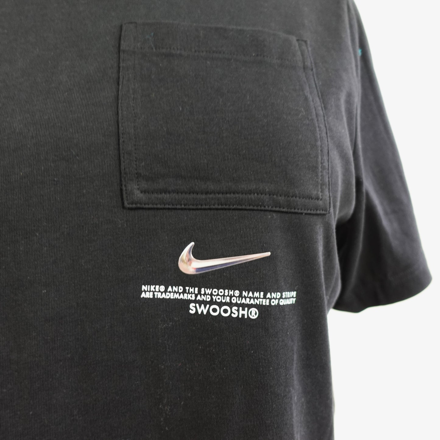 Nike Black Cropped Pocket Tee with Silver Swoosh