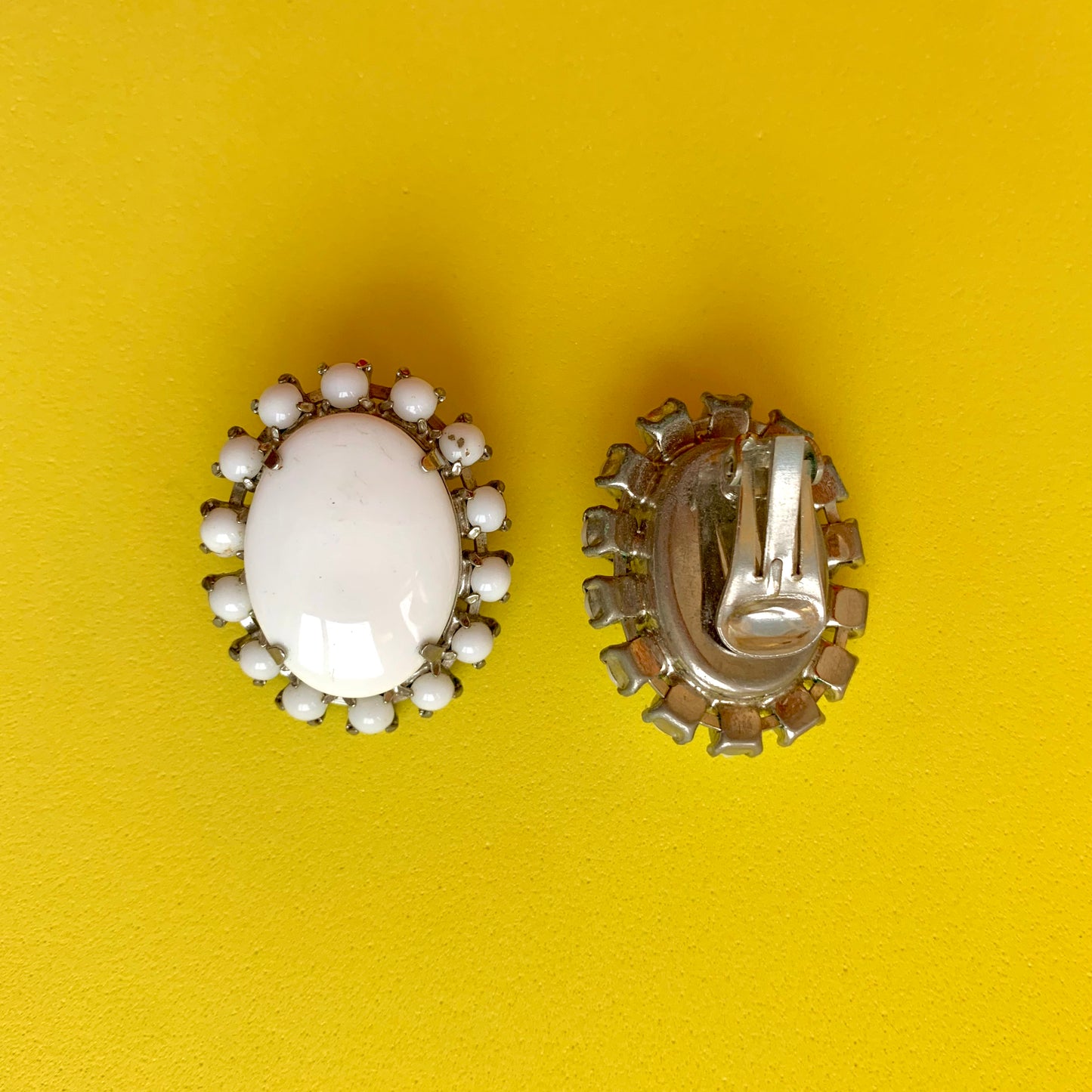 Vintage Large White and Silver-Toned Clip-Ons