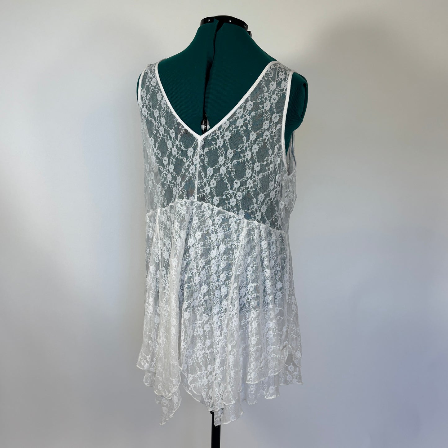 Torrid White Sleeveless Lace Top with Handkerchief Hem
