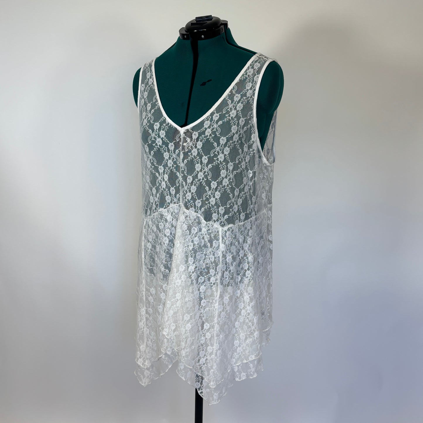Torrid White Sleeveless Lace Top with Handkerchief Hem